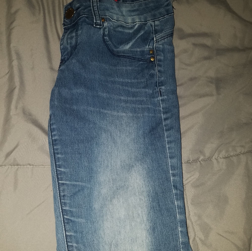 Skinny blue denim jeans.